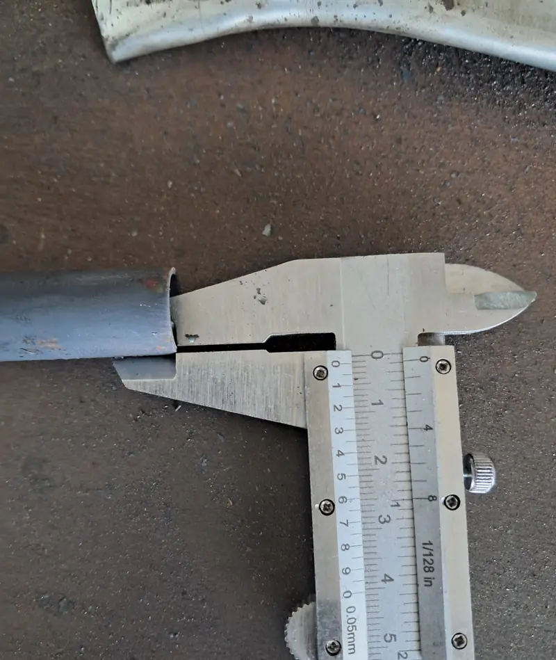 Taking a measurement with a caliper