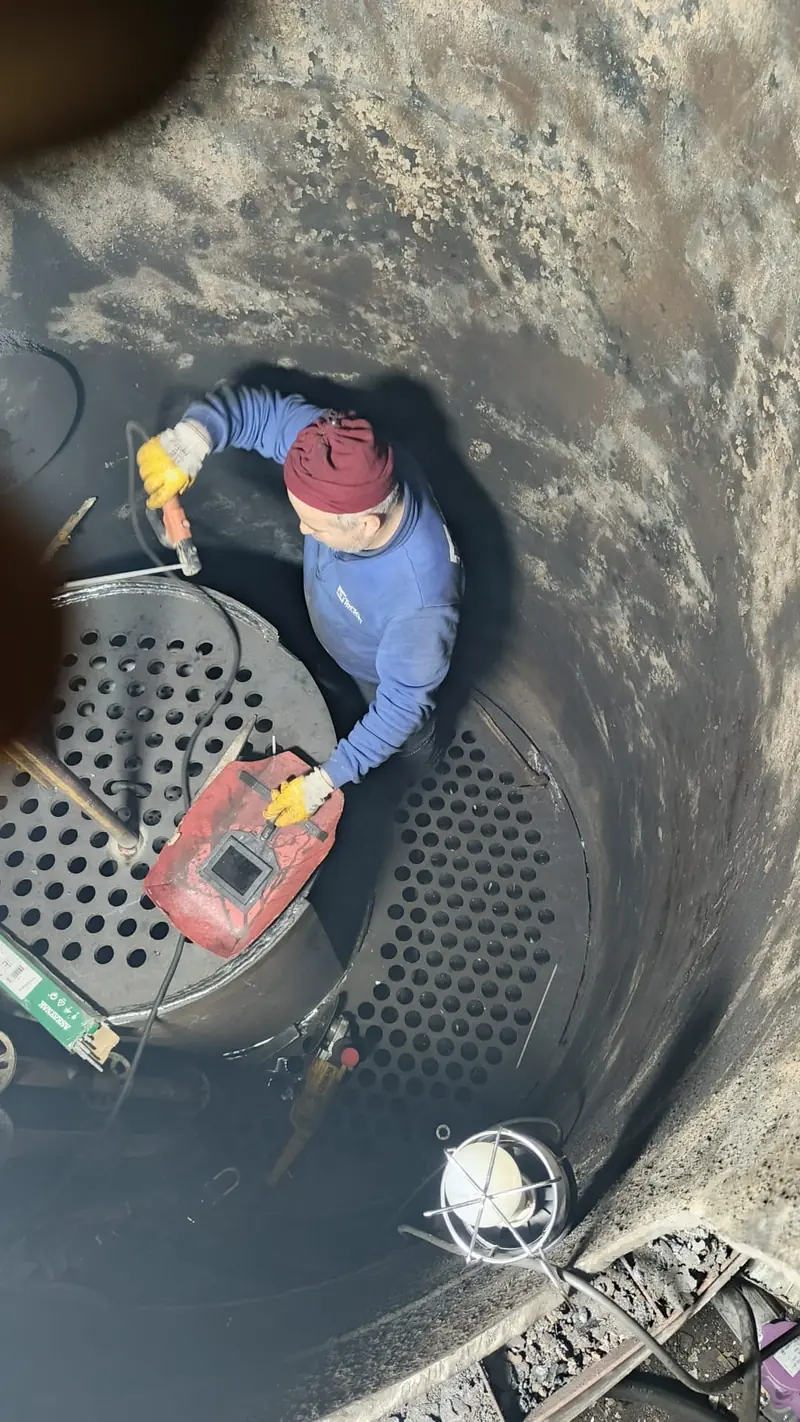 Work on the tube sheet, seen from inside the boiler